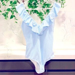 Jessica Simpson ruffle V neck shim suit